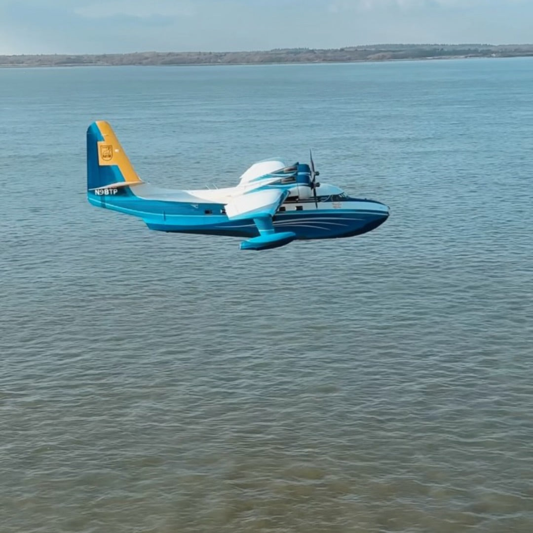 N98TP flying over the sea near the English coast